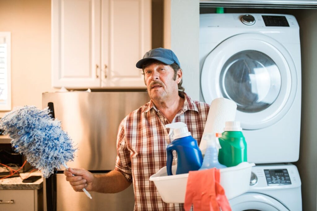 A man with cleaning equipment